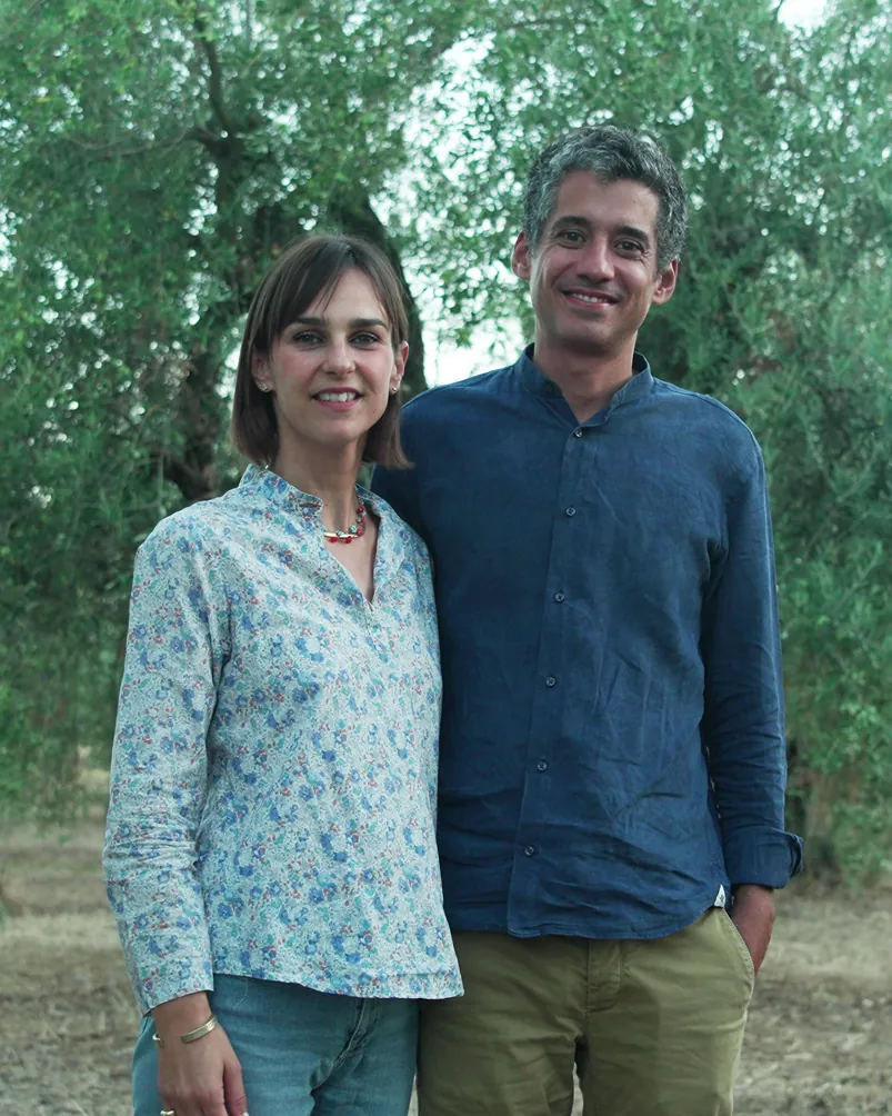 Valeria and Sebastiano among their olive trees